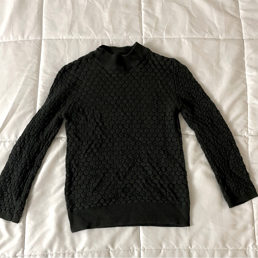 Green turtleneck sweater